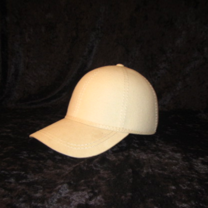 Sideview of  winter white Derby Bowler hat with suede brim.