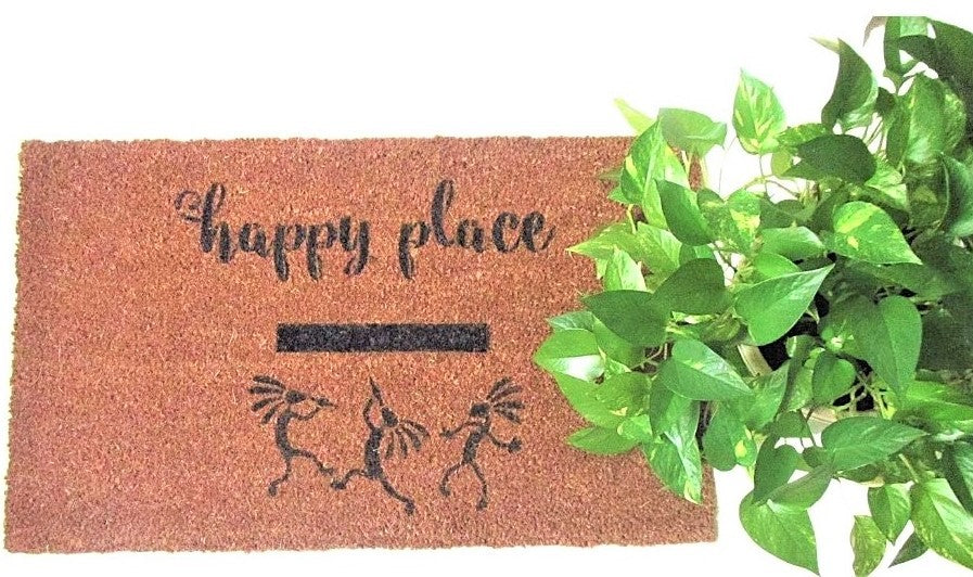 Natural fiber Happy Koko doormat with black hand painted words Happy Place with  Kokopelli dancers, house plant for decor.