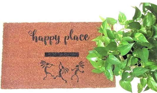 Natural fiber Happy Koko doormat with black hand painted words Happy Place with  Kokopelli dancers, house plant for decor.