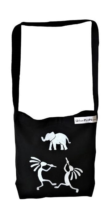 Black cotton tote with white hand-painted elephant and Kokopelli dancers on the front and an Urban PentHouse label.