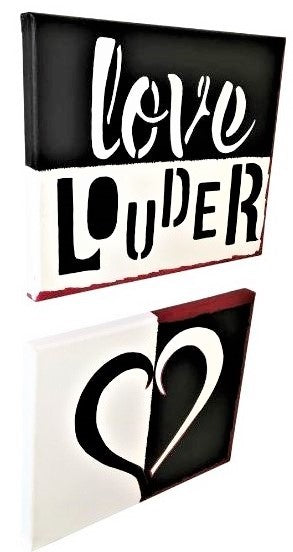 Right facing Solid love canvas set, hand painted Love Louder in white and black, the other showing a heart shape in bold white and black, red accent borders.