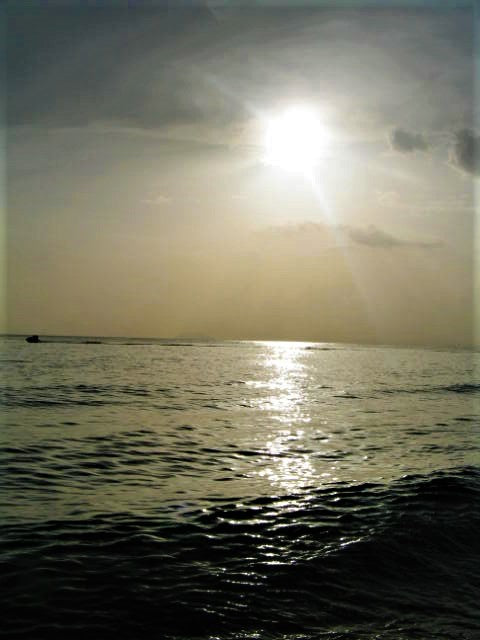 A digital gift card from Urban PentHouse Design for your vacation, presented with a sunset scenic beach backdrop.