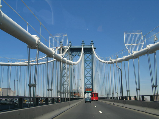 A digital gift card from Urban PentHouse Design with a scenic view  traveling on Manhattan  Bridge, NYC.