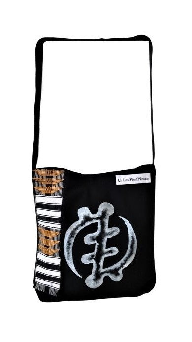 ​Black cotton tote with white hand-painted Gye Nyame and authentic Kente Cloth and Urban PentHouse label.