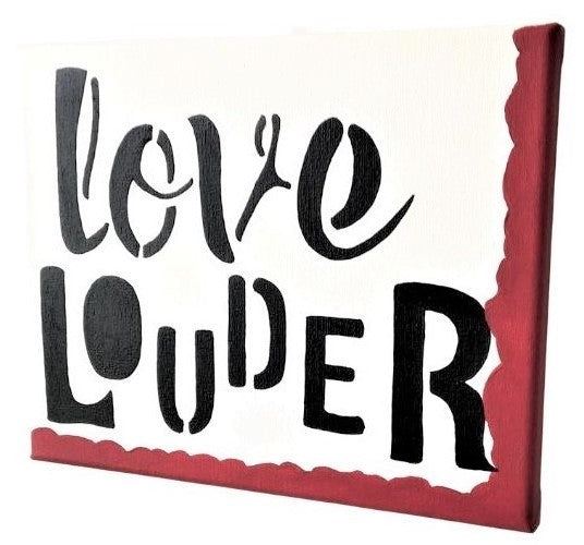 Left facing angle view of white background, black hand painted Love Louder black with red right side and bottom border.