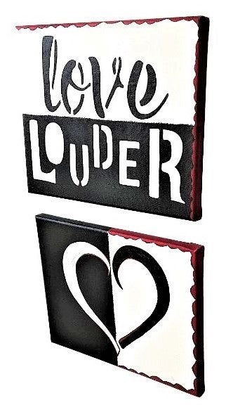 Left facing transparent love canvas set,  hand painted  heart shape in bold white and black, red accent borders, Love Louder in white and black.